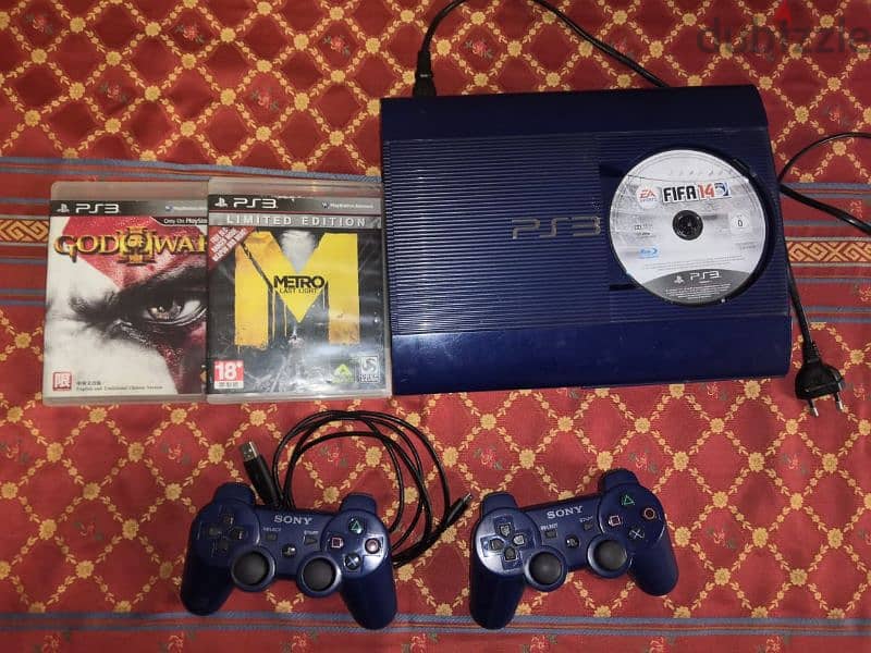 ps3 super slim blue edition 500 gb m3adale bynzal 3lya 1700 l3be 0
