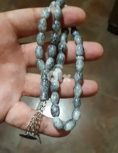 5$ ٥ for مسبحة لون رمادي مميز
