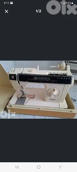 sewing machine with table ,both for 150 dollars