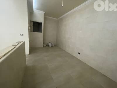 RWK131JS - Apartment For Sale in Ballouneh - شقة للبيع في بلونة