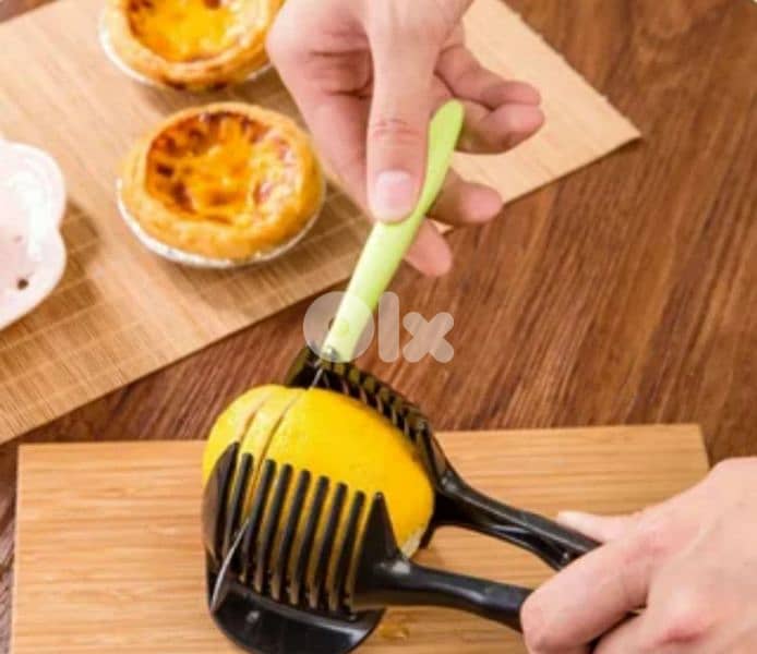 kitchen 2in1 slicing tool and tung 0