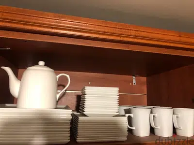 2 white spanish dining sets.