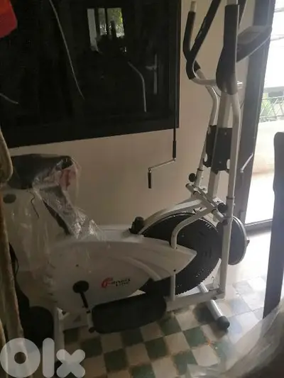 4 in 1 gym machine, elliptical,bicycle, waist, dumbels