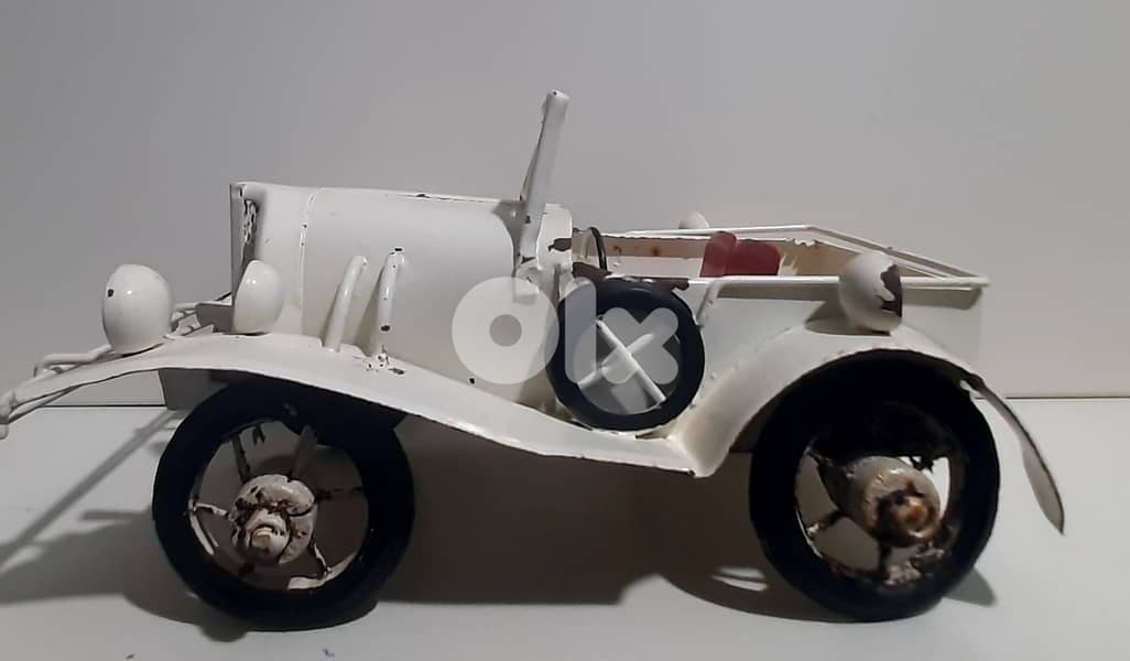 hand made old vintage cars and bycycle. 16